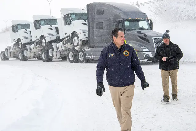 "Buffalo, NY- Governor Andrew Cuomo travels to closed Skyway Highway in Buffalo to view its condition and confronts truckers not adhering to Truck/Bus travel ban along the way."